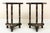 Pair of ebonized and parcel gilt side tables with hexagonal form top resting on round columns surmounted on a tripod base...