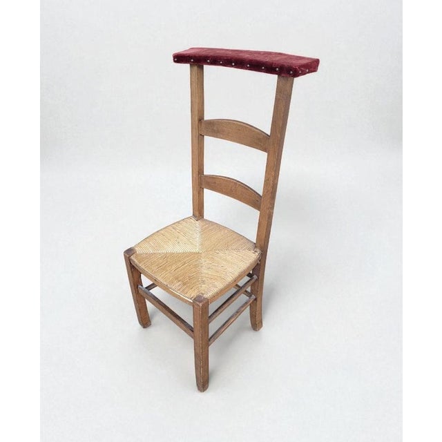 A beautifully preserved early 20th-century Dutch church chair, originally sourced from a monastery. This authentic prayer...