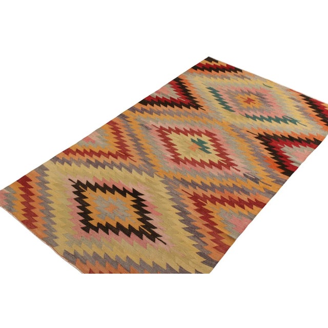 A 5x9 vintage Kilim rug of Afyon design lineage, handwoven in wool originating from Turkey circa 1950-1960. Enjoying...