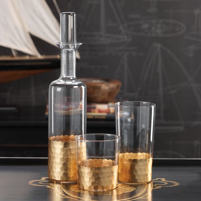 Introducing our Gold Leaf Fez Drinkware, a set of exquisite glasses that combines the allure of gold leaf patterns with a...