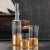 Introducing our Gold Leaf Fez Drinkware, a set of exquisite glasses that combines the allure of gold leaf patterns with a...