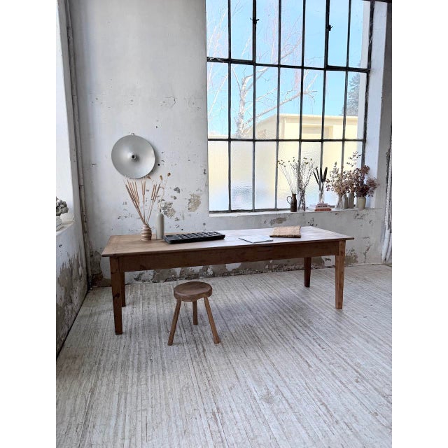 Antique 1950s solid oak farmhouse table with an extra-large size. we love its typical farmhouse look, with its tapered...