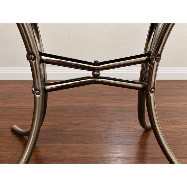 Stunning MCM dining table featuring a grayish-white cracked-ice top, chrome edge trim, and beautifully curved chrome legs...