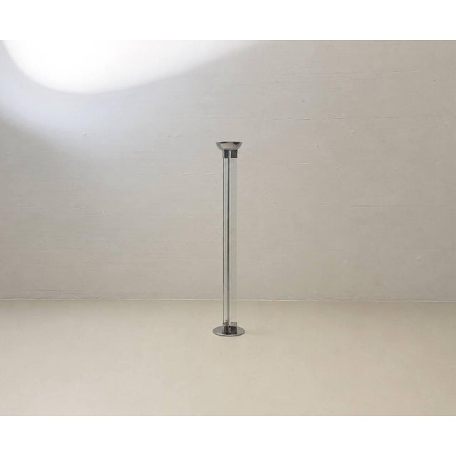 An architecturally designed halogen floor lamp from Italy, featuring a distinctive combination of glass, chrome, and...