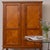 Stunning mahogany cabinet from France, 1930s. Beautiful carved wood cabinet with bookmatch detail. Two doors open to...