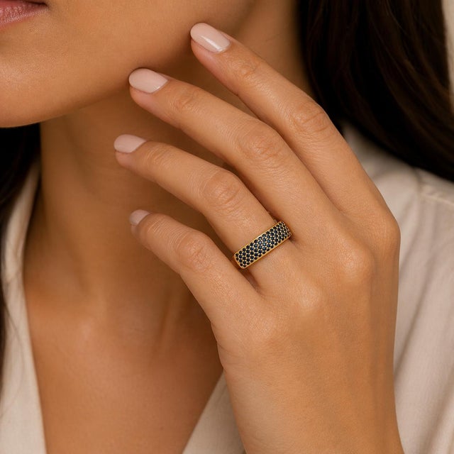 18k Rose gold ring by David Vangelder of Paris with 67 round sapphires weighing approximately 1.25 carats. Signed and...