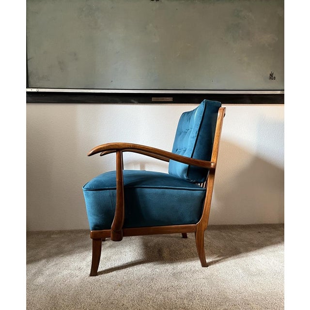 Elegant Art Deco armchair designed by Gyula Kaesz in the 1930s. This exceptional piece features a beautifully restored...