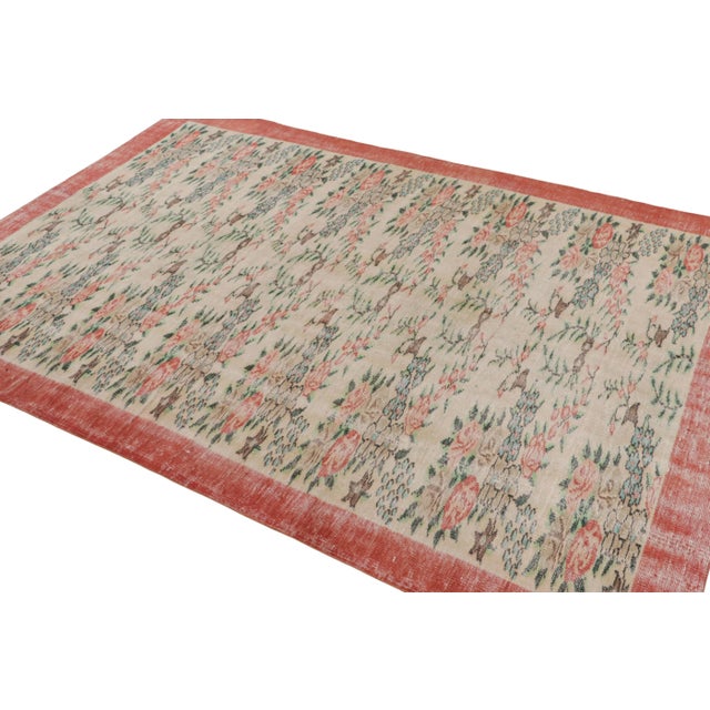 This vintage 6x9 rug, hand-knotted in wool, circa 1960-1970, as inspired by European influences, is a new addition to Rug...