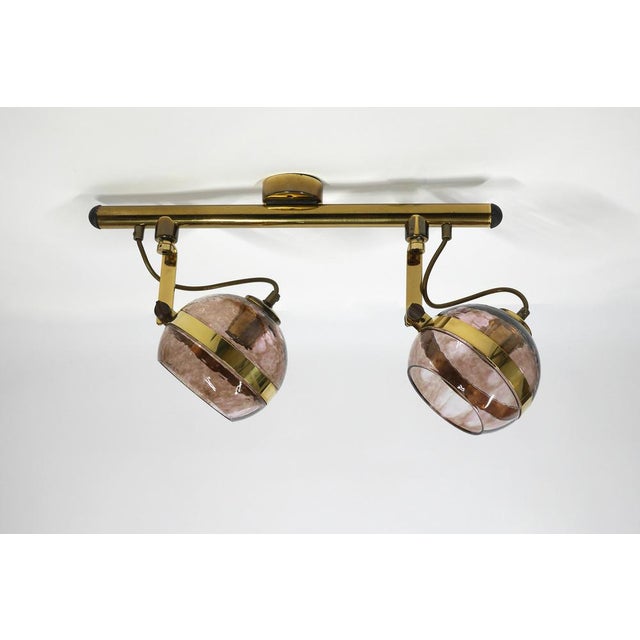 Stamard spotlights for brass ceiling mounting with two adjustable ball spots from the 1960s. The ball spots are made of...