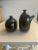 20th Century Glossy Black ceramic lidded sugar and creamer set by Lindt-Stymeist Discontinued. Creamer with lid is 6” tall...
