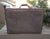 Hartmann's 29" Woodbox Suitcase from the Tweed Collection is a must-have for a traveler who loves vintage styling. This...