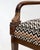 Classic wooden armchairs with gold leaf accents. Iconic black, white, rust zig zag patterned fabric. Missoni Style. Set