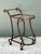 This elegant vintage bar cart, crafted in the style of Hermès, showcases a sophisticated combination of glass and metal...