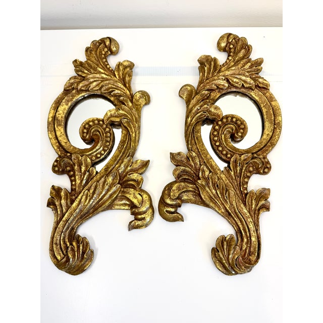 Lovely and unique pair of vintage mirrors to use together or separately (price includes the pair) They have pretty gilded...