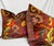 Custom pair of 22" pillows covered in Etro "Nimphea Floral Velvet" in color ruggine and backed in a coordinating velvet....