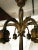 Antique French bronze five light chandelier. The ornamented bronze frame includes acanthus motifs on the arms and shade...