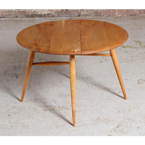 A mid century ercol drop leaf side table circa 1960s. Excellent restored condition. H: 40cm w: 63.5cm d: 37.5cm/62cm