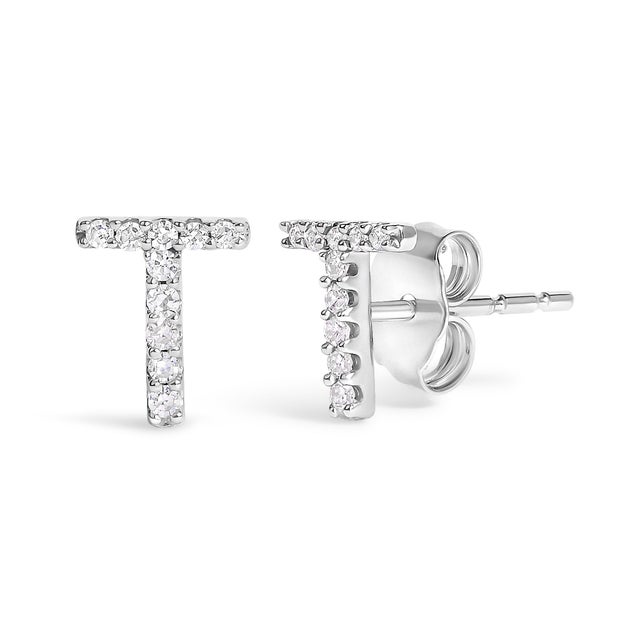 Expertly crafted to symbolize individuality and grace, this exquisite "T" initial stud earring is fashioned from radiant...