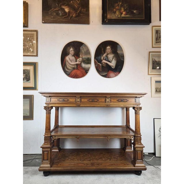 A monumental three-tiered sideboard in the Neo-Renaissance style A monumental three-tiered sideboard in the Neo-...