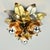 Stunning mid century flush mount, made around the 1960s. This light is made from aluminum and brass leaves, and has a...