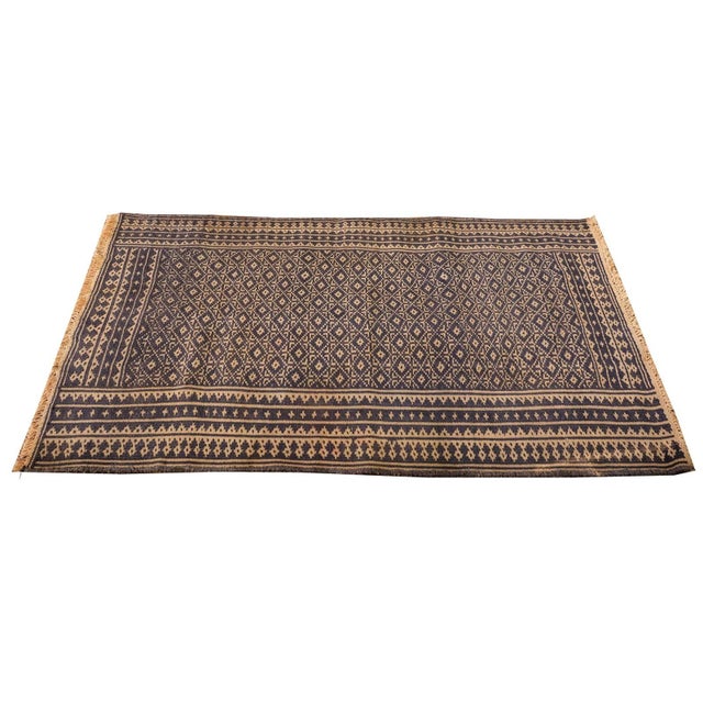 This charming Vintage Persian Ziloo rug, dating to circa 1950, is a sophisticated example of Iran's flat-weaving...