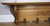 A striking large Vintage French coat hanger featuring beautifully carved detailing and a warm oak finish that enhances its...