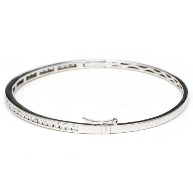 Contemporary 14KW Channel Set Diamond(.97) Oval Bangle Bracelet For Sale - Image 3 of 3