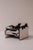 This vintage example has been completely reupholstered in genuine black and white cowhide, giving the classic italian...