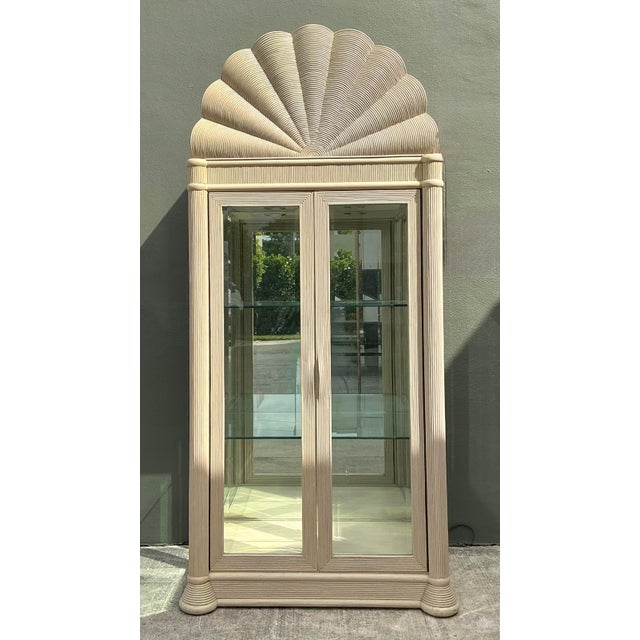 This monumental display cabinet is a quintessential example of 1980s Postmodern design with a distinctive Coastal...