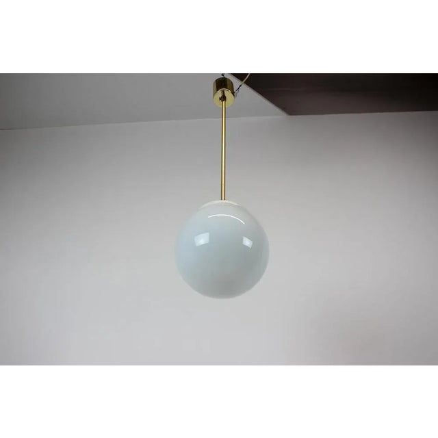 Made in Czechoslovakia. Made of gass, brass, plastic. New Cabling 1x60W,E27 or E26 bulb. Re-polished. Good Original...