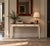 Maison Jansen Style, Neoclassical Console Table, White Painted Wood, Gilt Bronze, Mirror, France, 1970s A Neoclassical...