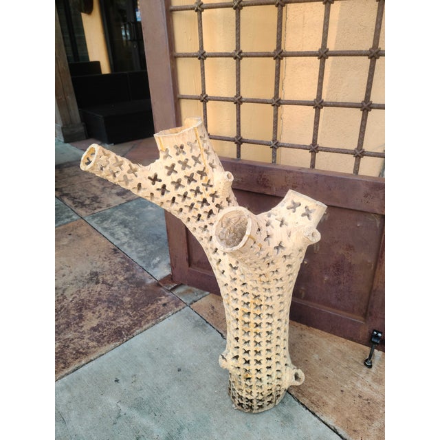 A beautifully hand-carved organic wood sculpture measuring 34.5 inches high and 22 inches wide at its broadest point,...