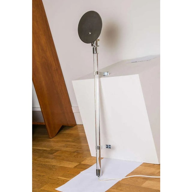 A pair of sconces created by Hamburger (1941) for Knoll. An acrylic resin rod is masking the wire and making it almost...