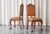 This is a very rare pair of 't Woonhuys Amsterdam side chairs in very desirable patinated cognac leather, made in the...