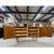 Handsome Danish Modern teak credenza by Poul Hundevad. The cabinet features two doors that open to reveal drawers and...