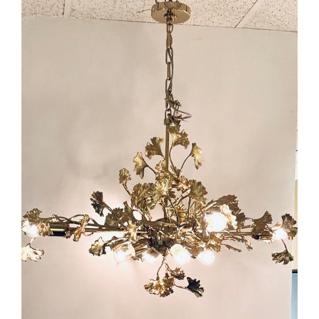 Original retail $5500, stylish Made Goods Modern Brass Ginkgo Teresa Chandelier, showroom floor sample