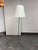 Design Plus Gallery presents a Tapered Shade Floor Lamp from West Elm. This floor lamp pairs an off-white tapered shade...