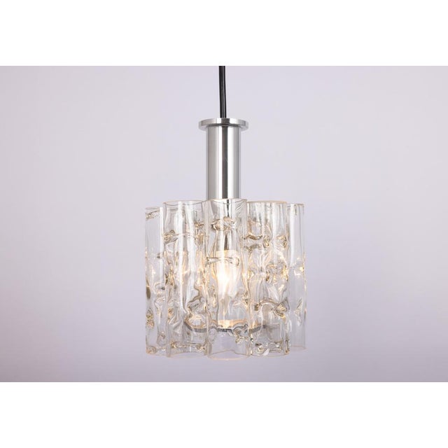 1 of 5 petite murano pendant lights designed by doria, 1970s very good condition. Cleaned, well-wired. Each pendant...