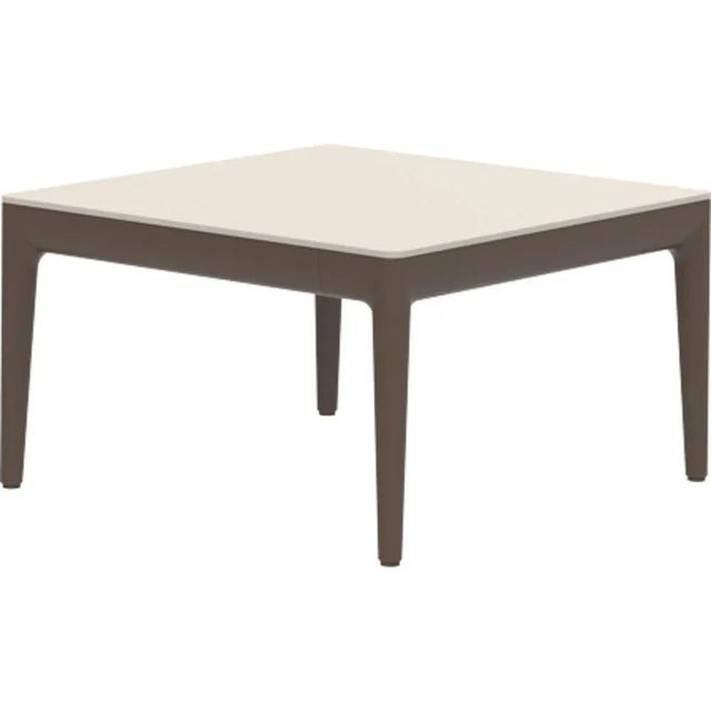 Ribbons bronze coffee table 50 by mowee dimensions: d50 x w50 x h29 cm material: aluminum and hpl top. Weight: 8 kg. Also...