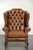 This beautiful Chesterfield wingback chair is made of cowhide leather in a lovely light brown color and offers a...