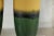This striking pair of tall ceramic vases showcases the artistry of layered glazing, with a palette that moves seamlessly...