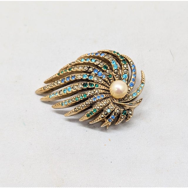 1980s goldtone single faux-pearl and round two different shapes of blue and green rhinestones with round rivoli faux-...