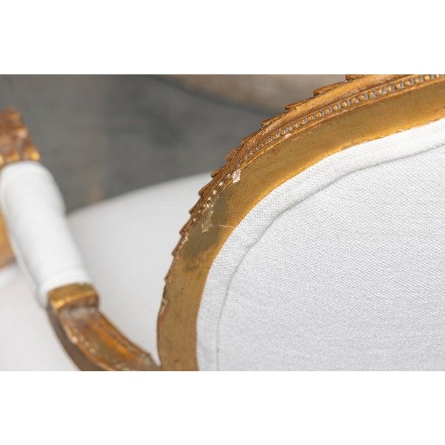 Wood Early 20th Century 0ne of a Pair of Identical Louis XVI Style Gilt Wood Armchairs For Sale - Image 7 of 7
