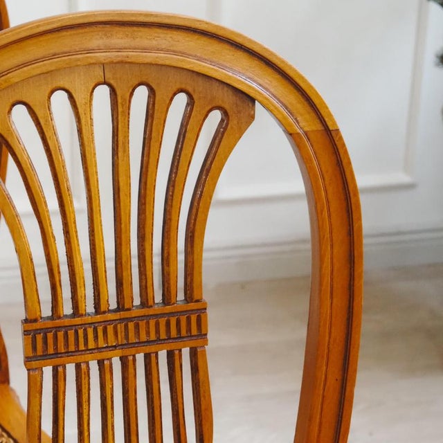 Four louis xvi-style chairs, crafted in the 20th century as period furniture based on classical models. The balloon-shaped...