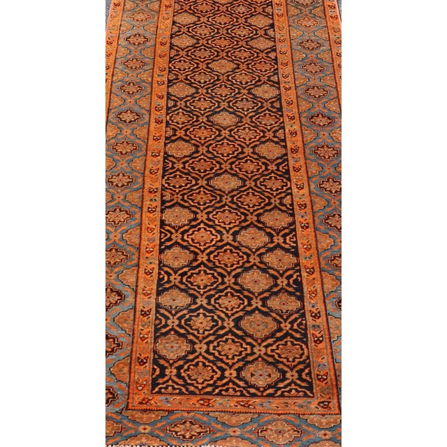 Large antique Persian Khorasan rug with floral design in navy blue background, blue and orange rug PTA-21007, country of...