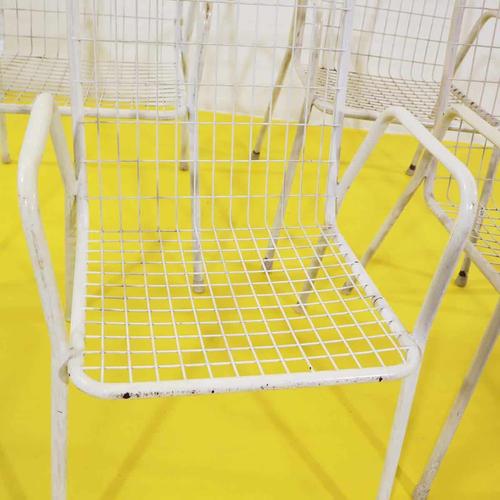 Set of 4 white metal garden chairs with a mesh structure.