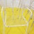 Set of 4 white metal garden chairs with a mesh structure.