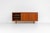 Sideboard in teak Svend Dyrlund (Denmark, 1960s). A beautifully crafted piece showcasing exceptional Danish design and...