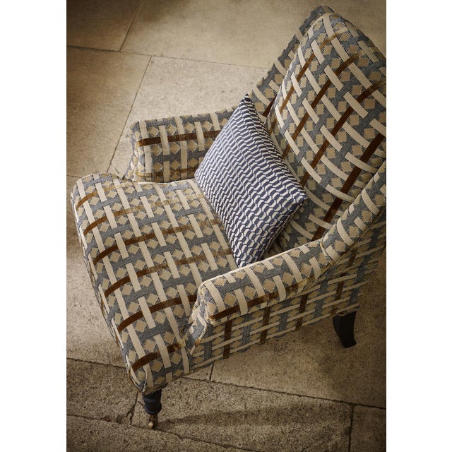 With its striking diamond and check pattern this small-scale geometric fabric looks incredible in both classic and...