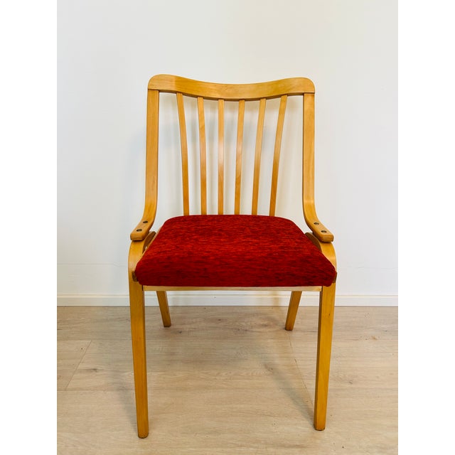This Vintage Chair by famous furniture designer Ludvik Volak have been carefully restored and upholstered in our family...